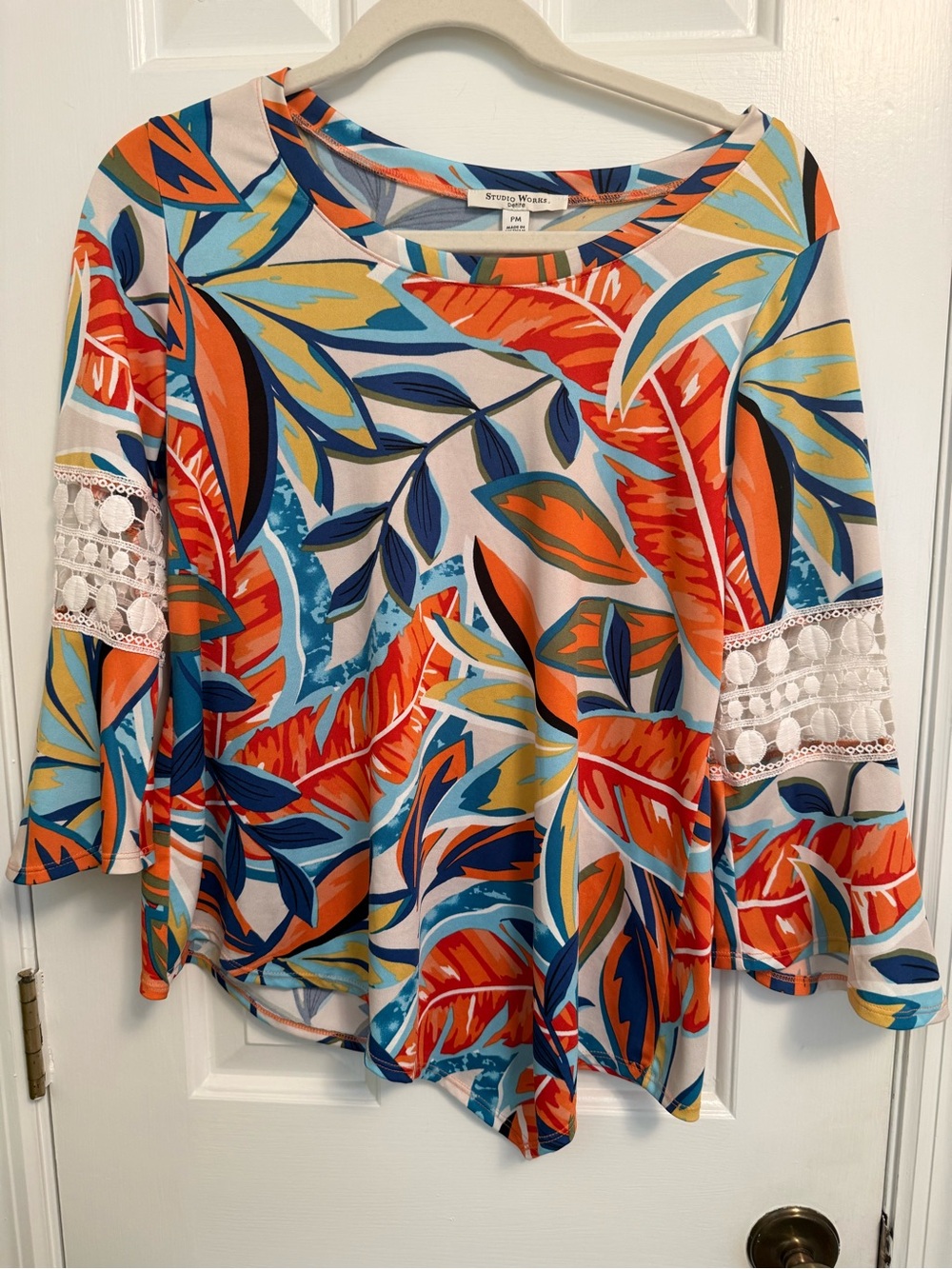 Multicolored top with many unique details